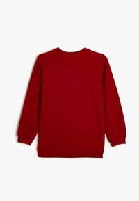 Felpa rossa a maniche lunghe con collo a giro, polsini a coste e una texture liscia. Vista posteriore, che mostra un colore solido e dettagli minimi.