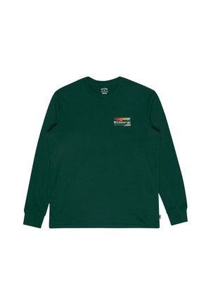 Long-sleeve, dark green t-shirt made of cotton. Features a small multicolored logo patch on the chest. Straight hem and crew neck design.