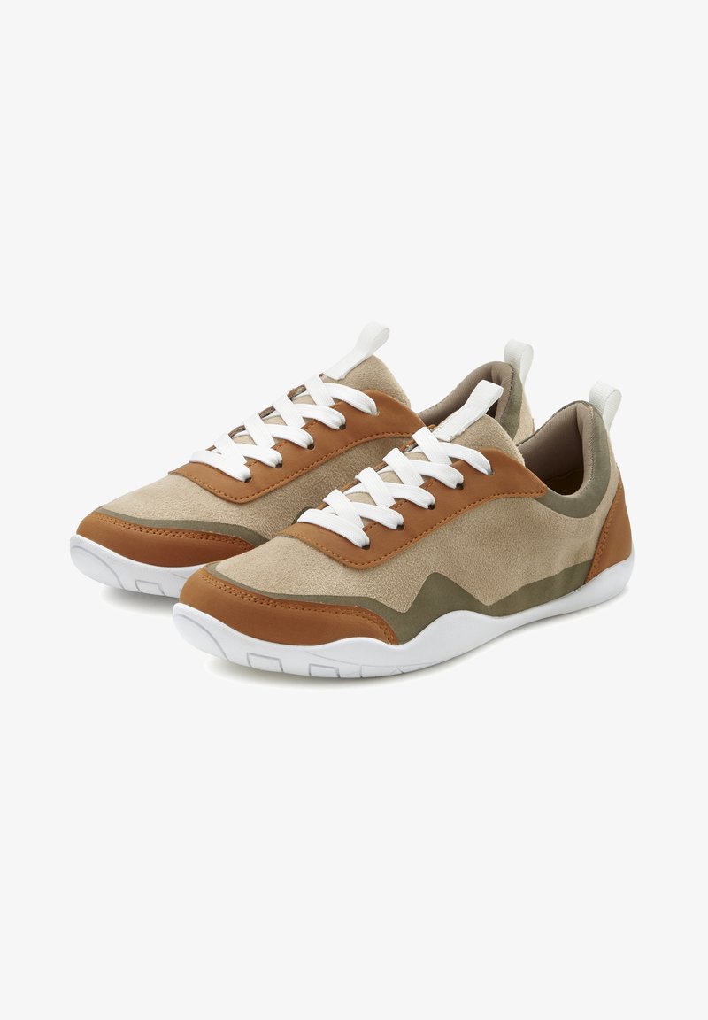 Sneakers made of tan suede and brown leather, featuring white laces and a white sole. A green accent pattern is present on the side.
