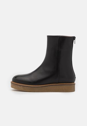 Platåstövletter - black