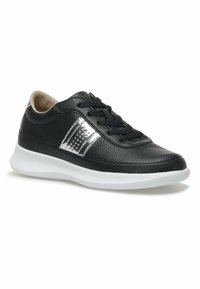 Black leather sneaker with a textured surface, metallic accent stripe, and white rubber sole; features black laces and a padded collar.
