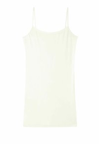 Camiseta de tirantes finos en color crema claro, hecha de una tela suave. Diseño simple, corte recto y sin patrones ni adornos.
