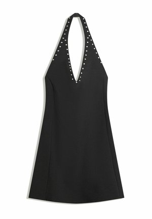 Black halter-neck dress with deep V-neckline, silver studs lining the neckline, and an A-line silhouette.