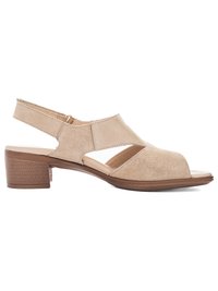 Beige suede low-heeled sandal with ankle strap, open toe, and cut-out sides, featuring a cushioned insole and block heel.