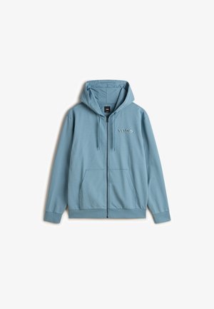 Felpa con zip di colore azzurro chiaro, con logo frontale, due tasche laterali, cappuccio con cordino regolabile e polsini e bordo a coste. Materiale in cotone morbido.
