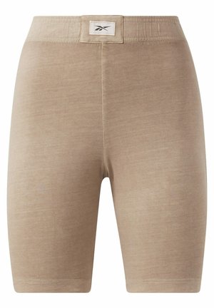 Beżowe spodenki rowerowe wykonane z miękkiego materiału, z szerokim pasem z metką. Gładka tekstura, długość do kolan i bez wzorów.