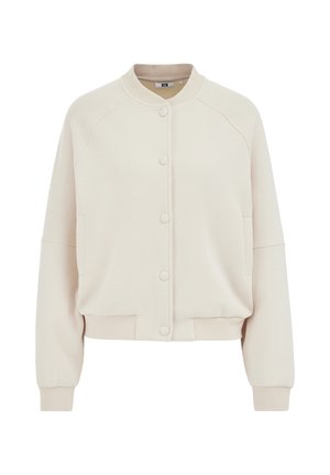 Pehme beežist nööpidega bomberjakk soonikkoega krae, mansettide ja alumise äärega, millel on pikad varrukad ja küljetaskud.