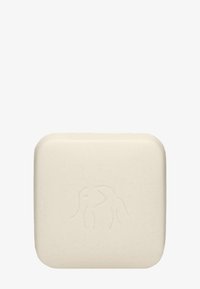 Solid, square soap bar in off-white with a smooth texture; features an embossed elephant design on the surface.
