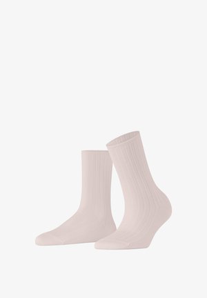 Jasnoróżowe skarpetki sięgające kostki z prążkowanego materiału, o gładkiej teksturze i wzmocnionym palcu, z mankietem na górze zapewniającym pewne dopasowanie.