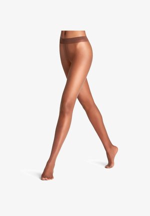 Collant trasparenti marroni con finitura opaca e vita alta. Le gambe sono lisce, evidenziando un aspetto di tono naturale della pelle.