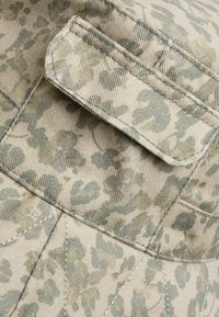 Next Hatte - camouflage