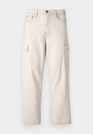 Beige cargo pants made of cotton, featuring two side pockets, straight leg design, and contrasting stitching details.