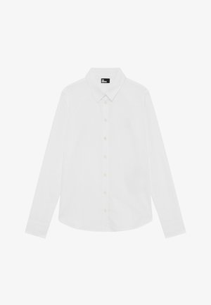 Camicia bianca a maniche lunghe con colletto classico, chiusura con bottoni davanti e un sottile dettaglio del logo sul petto. Tessuto morbido.