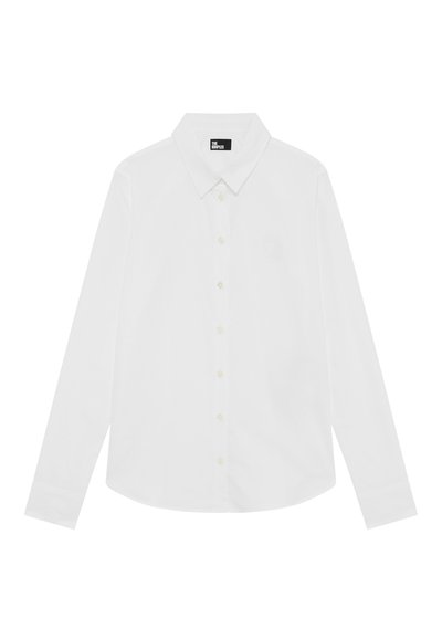 White long-sleeve shirt with a classic collar, button-front closure, and a subtle logo detail on the chest. Smooth fabric texture.