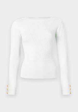 Jasnozielony prążkowany sweter z długim rękawem, dekoltem w kształcie litery V oraz złotymi guzikami na mankietach. Gładka faktura i dopasowany krój.