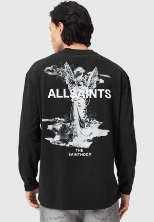 - Bluzka z długim rękawem