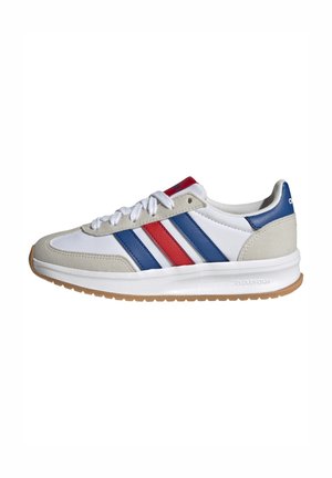 White sneaker with red and blue stripes, featuring a suede toe cap and heel, mesh lining, and a textured gum rubber sole.
