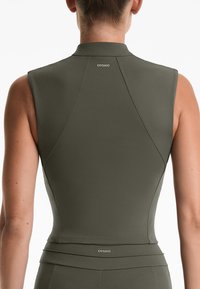 OYSHO EVERMOVE CREASE - Top - brown