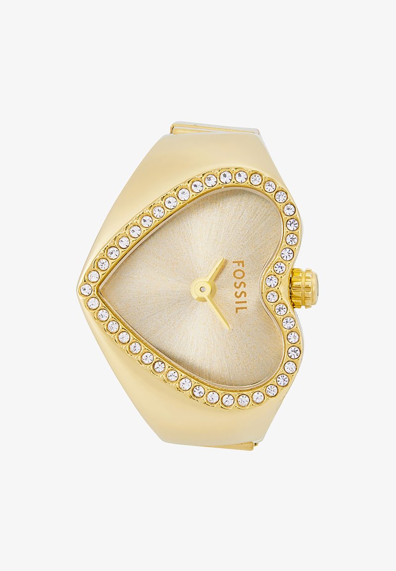 Montre en forme de cœur en or avec un cadran texturé en or clair, entourée d'une rangée de cristaux transparents, et une petite couronne sur le côté.