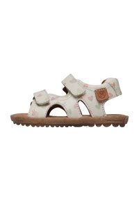 Sandalo leggero color crema con motivi a cuore pastello. Presenta due cinturini regolabili, design open-toe e una suola in gomma marrone texturizzata.