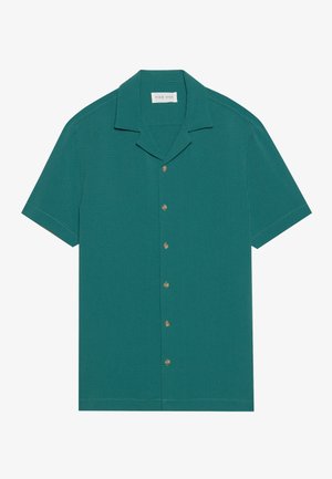 Short-sleeve button-up shirt in teal color, featuring a textured pattern, a camp collar, and brown buttons along the front placket.