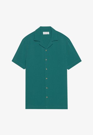 Short-sleeve button-up shirt in teal color, featuring a textured pattern, a camp collar, and brown buttons along the front placket.