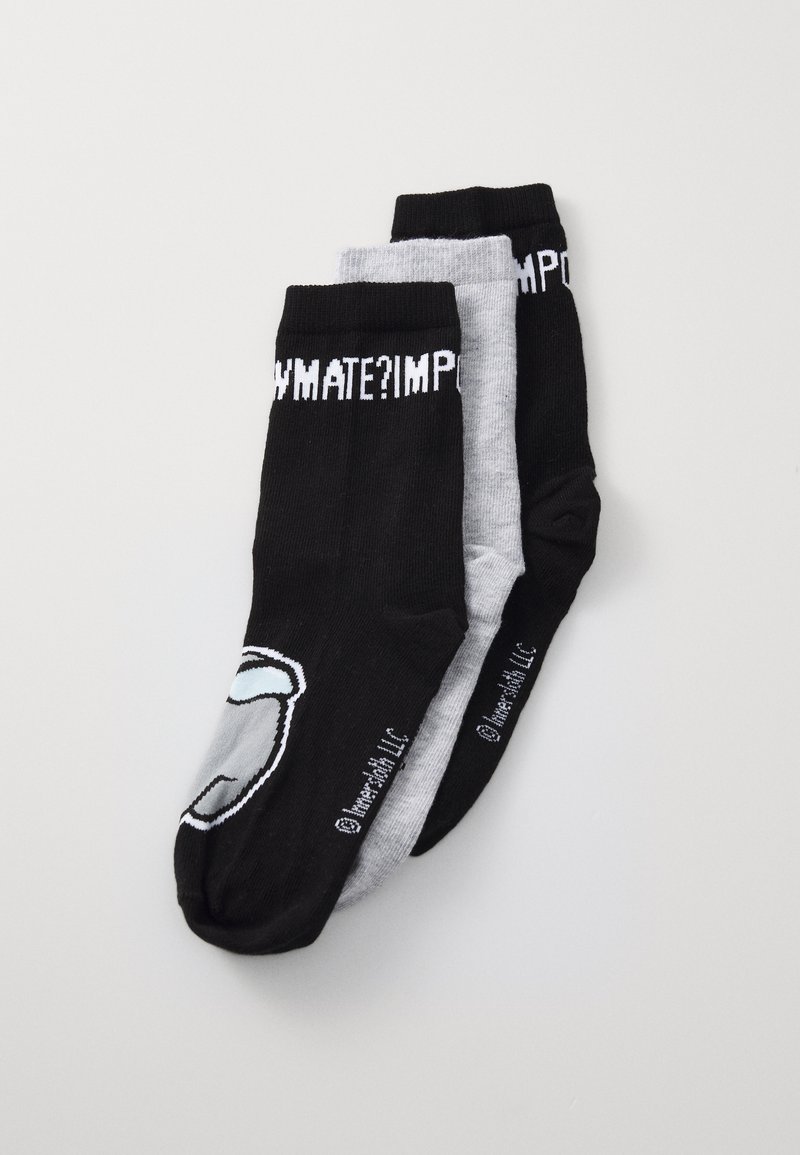 Three pairs of socks: one black with a cartoon character design, one gray, and one black with white text at the top. Cotton blend material.