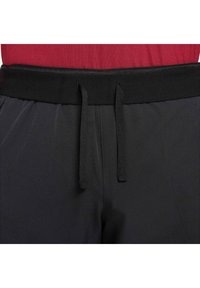 NIKECOURT - Krótkie spodenki sportowe
