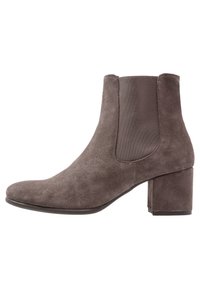 Bottine en suède gris avec un orteil arrondi, des panneaux latéraux en élasthanne et un talon bloc. Texture lisse avec une subtile brillance.