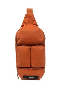 Borsa a tracolla arancione in tessuto con manico superiore, dotata di tre tasche frontali con zip, design elegante e etichetta nera TIMBUK2.