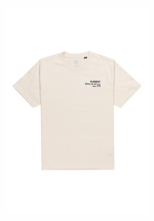 Short-sleeve, crew-neck t-shirt in light beige cotton. Features dark gray brand text on the chest with an inscription below.