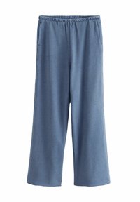 Lichtblauwe, wijde broek gemaakt van zachte stof met een elastische tailleband, voorzien van twee zijzakken en een gladde textuur.