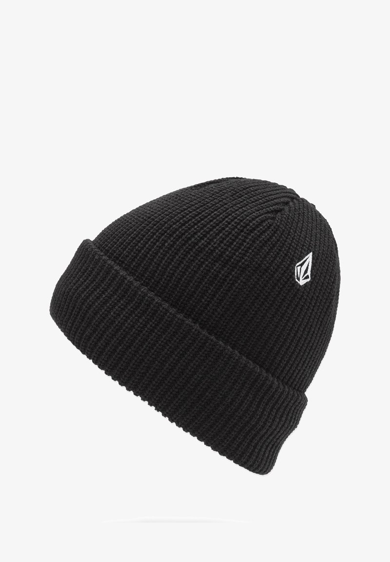 Zwarte gebreide beanie van gestructureerde stof, met een omgeslagen rand en een klein wit logo-embleem aan de zijkant.