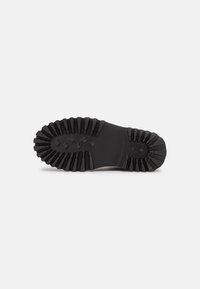 Copenhagen Shoes Kotníkové boty na platformě - brown
