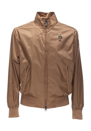 Light brown zip-up bomber jacket with ribbed cuffs and hem, two front zip pockets, and small black and yellow brand tag on chest.
