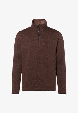 Pull en polaire marron avec un col zippé moitié, tissu texturé, manches longues et un petit logo noir sur la poitrine.