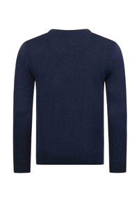 Marineblauer Pullover mit langen Ärmeln, Rundhalsausschnitt, gerippten Bündchen und geripptem Saum, von hinten vor weißem Hintergrund gezeigt.