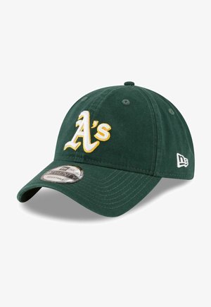 Green baseball cap with a curved brim, featuring a white and yellow embroidered "A's" logo on the front and a small white logo on the side.