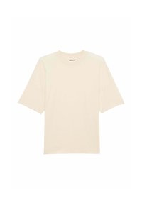 Krémové tričko vyrobené z měkké bavlny, s kulatým výstřihem a krátkými rukávy, s mírně volným střihem. Žádné viditelné vzory nebo akcenty.