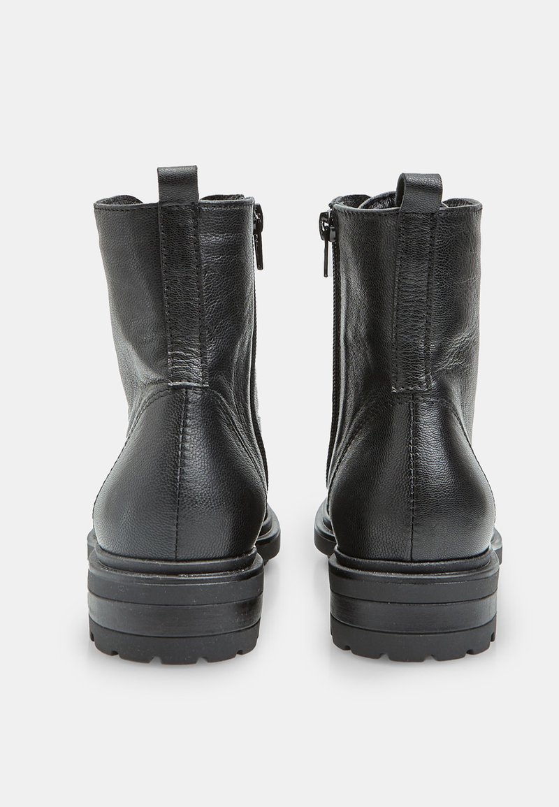 Anfibi donna inverno con zip laterale | Stile e comfort