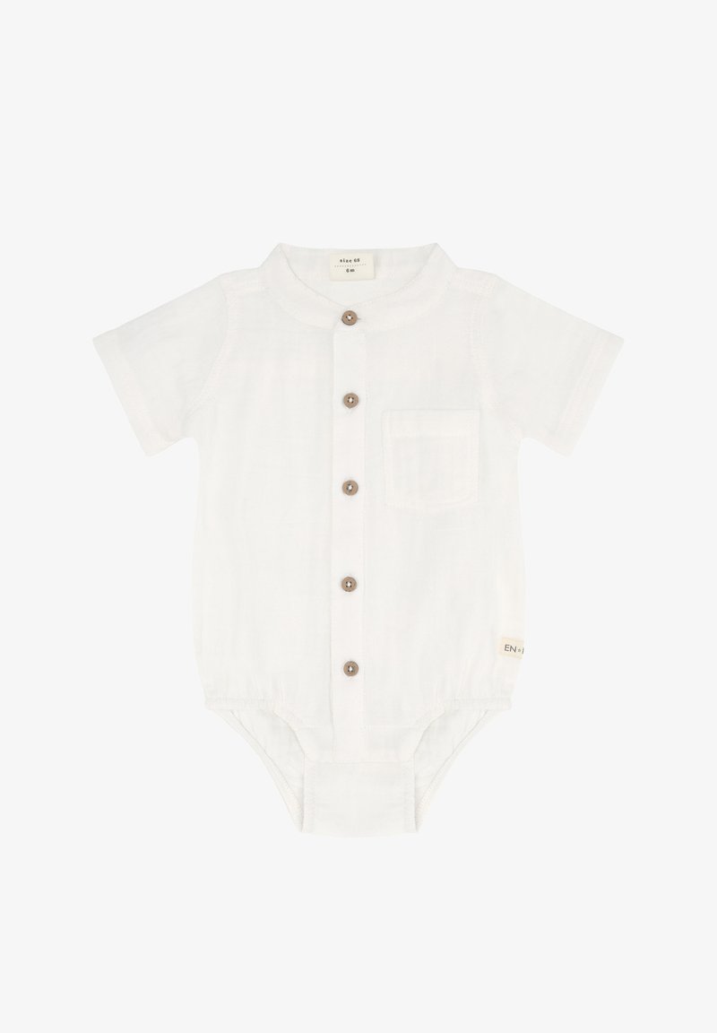 Białe body z krótkim rękawem wykonane z miękkiego materiału, z okrągłym kołnierzem, pięcioma drewnianymi guziczkami i detalem w postaci przedniej kieszeni.
