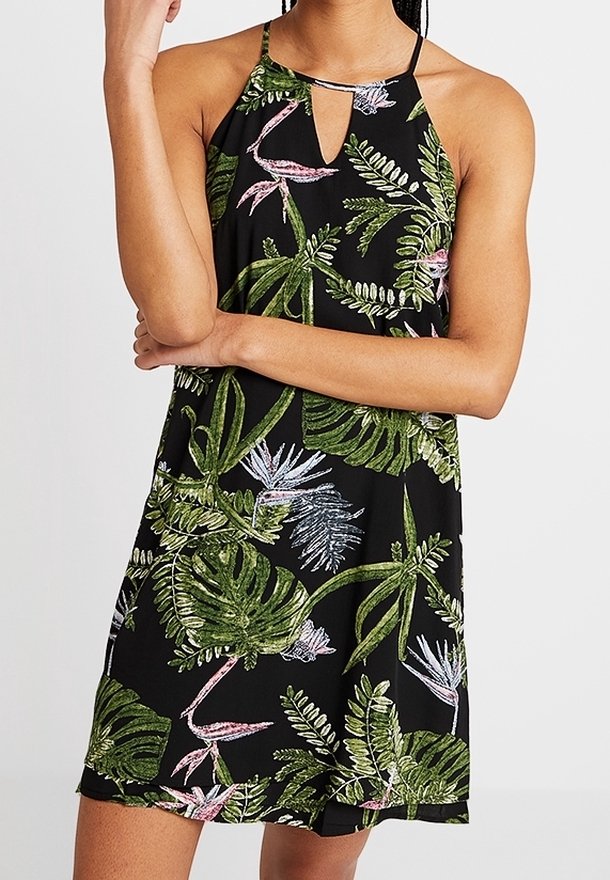 Robe noire sans manches avec imprimé de feuilles et fleurs tropicales vertes et roses, avec un petit détail d'encolure en forme de trou de serrure à l'avant.