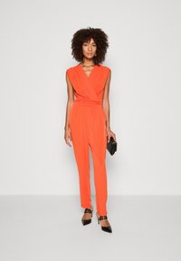 Esprit Overal - bright orange