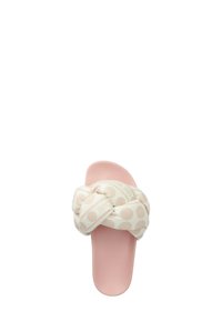 Lichtroze sandaal met een knoop in de zachte stoffen band met witte stippen, en een gladde rubberen zool.