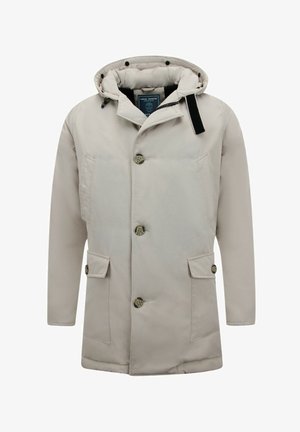 Beige geïsoleerd jack met capuchon, voorzien van een ritssluiting en knoopsluiting, twee voorzakken en een textuurstof. Geaccentueerd met zwarte details.