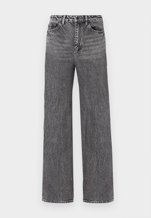 Jeans a vita alta con gamba ampia in denim nero sbiadito. Presenta cinque tasche e chiusura con bottoni. Tessuto testurizzato con dettagli di cucitura.