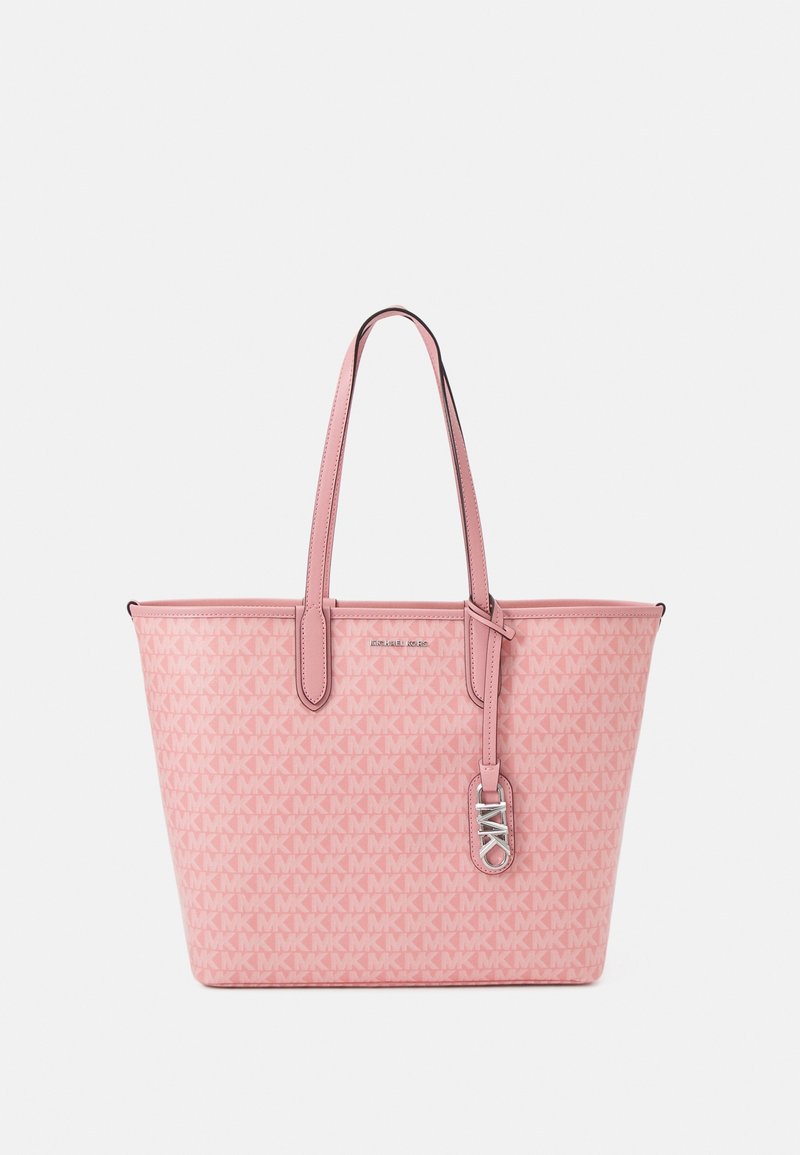 Sac cabas rose Michael Kors avec doubles poignées, motif répétitif du logo MK et un charm métallique MK suspendu.