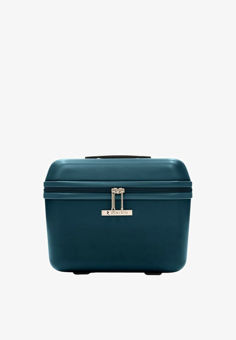 Valigia rigida color teal con superficie textured, chiusura a cerniera e accessori in metallo argentato. Dotata di maniglia superiore per il trasporto.