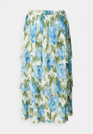 Pleated tiered skirt in white with blue floral patterns and green leaves. Features a stretchy waistband and a flowing, lightweight fabric.