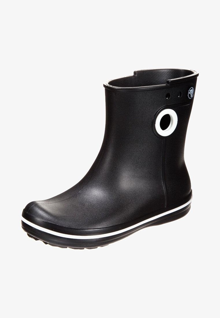 Botte de pluie en caoutchouc noir avec un accent blanc rond, texture lisse, hauteur aux chevilles et une bande blanche sur la semelle. Design à bout rond.